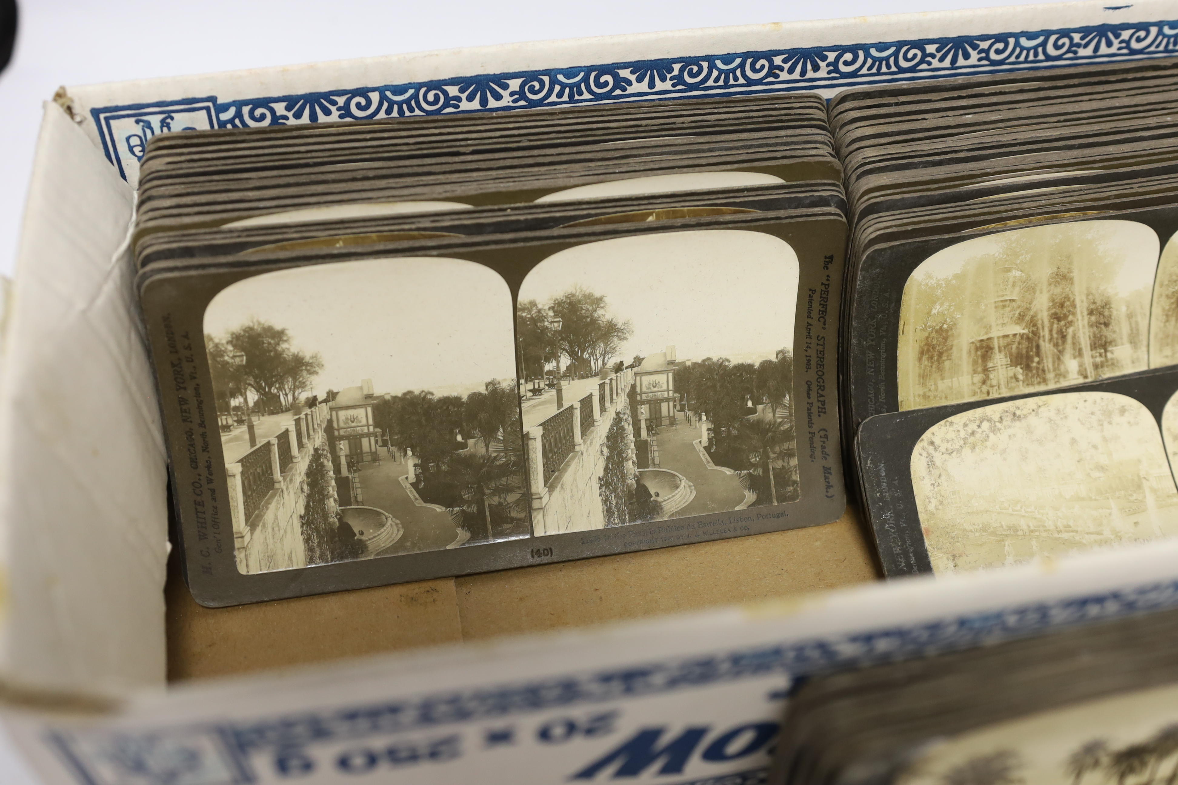 A Stereoscope viewer and slides, mostly topographical including Middle Eastern scenes